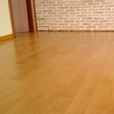 Το ξύλινο δάπεδο συνδιασμένο αρμονικά με χτιστό πάσο.   